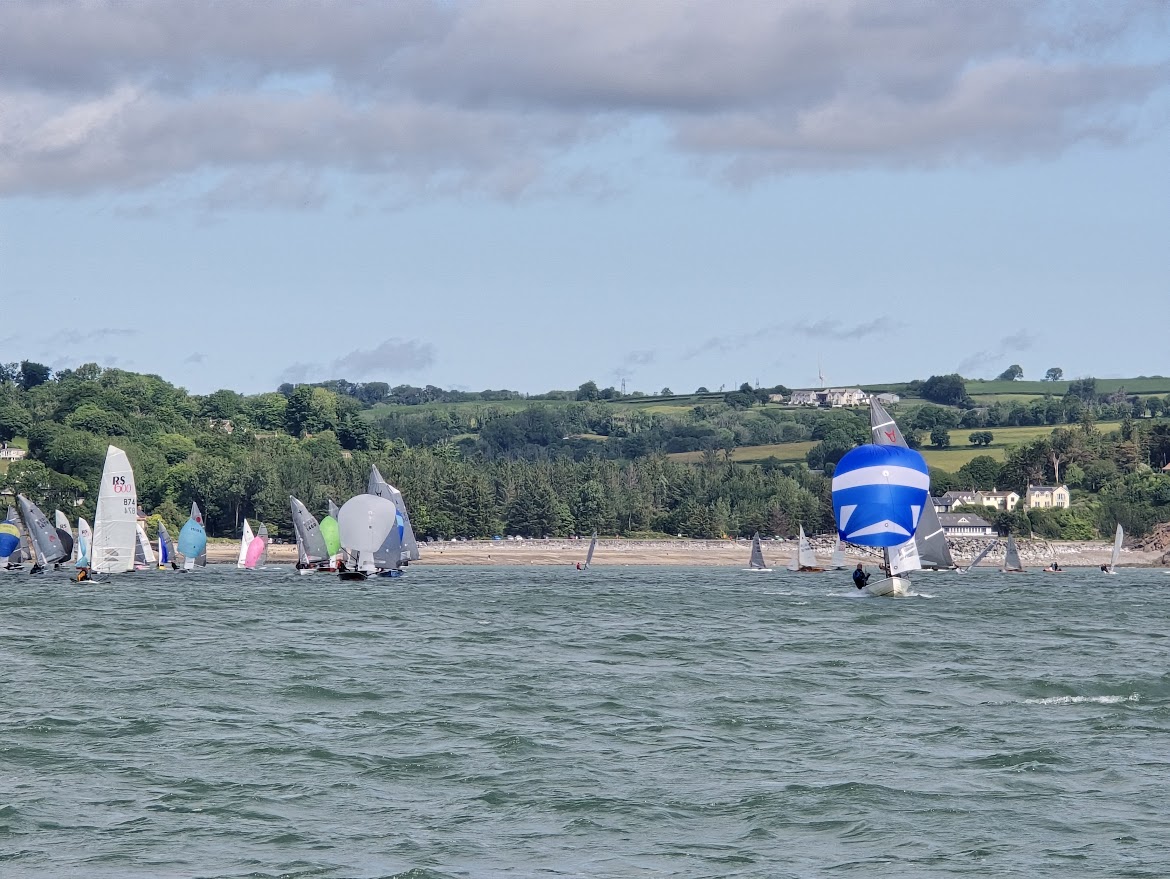 Boats sailing off the beach